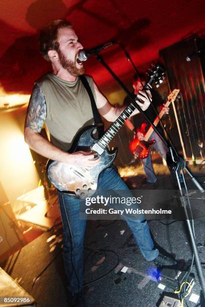 Photo of TAINT and James 'Jimbob' ISAAC and Chris WEST, James 'Jimbob' Isaac and Chris West performing on stage