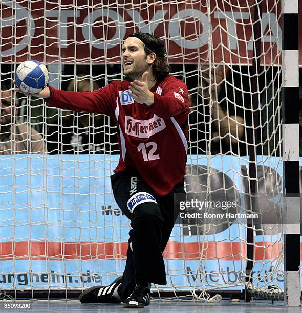 Goalkeeper Silvio Heinevetter of Magdeburg gestures during the Toyota Handball Bundesliga match between SC Magdeburg and HSV Hamburg at the...