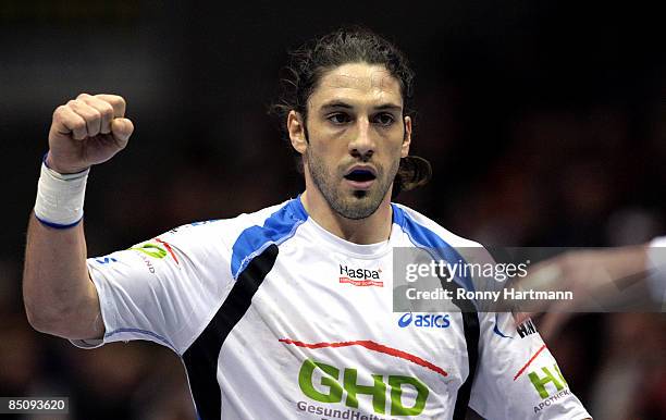 Bertrand Gille of Hamburg celebrates during the Toyota Handball Bundesliga match between SC Magdeburg and HSV Hamburg at the Boerdeland Hall on...