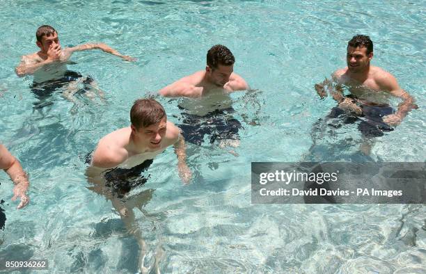 British and Irish Lions Owen Farrell, Alex Cuthbert, Mike Philiips Dan Lydiate during a post match recovery session in the pool of the Grand Hyatt...