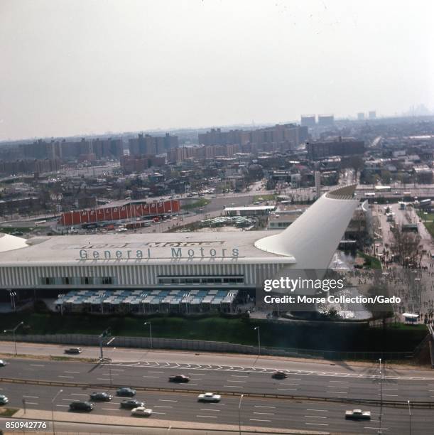 Panoramic aerial view facing southwest from the observation tower of the New York State Pavilion with the General Motors Pavilion at the New York...