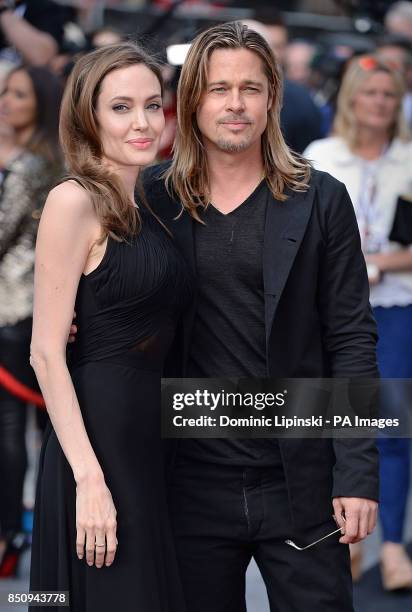 Angelina Jolie and Brad Pitt arriving for the world premiere of World War Z, at the Empire Leicester Square, London.