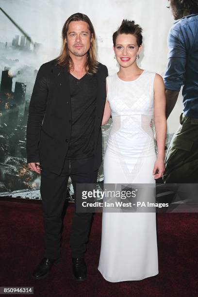 Brad Pitt and Daniella Kertesz arriving for the World premiere of World War Z, at the Empire Leicester Square, London.