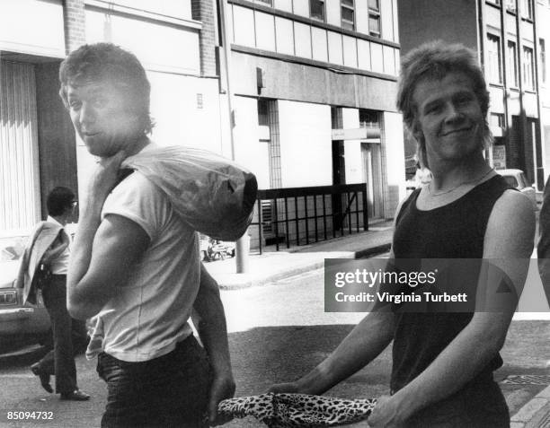 Photo of Paul COOK and Steve JONES and SEX PISTOLS; Steve Jones and Paul Cook on the set of the Pretty Vacant video shoot