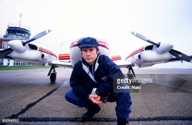 Photo of Bruce DICKINSON; Bruce Dickinson, flying his twin prop plane to Paris from Biggin Hill airport. 1998