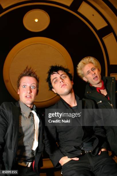 Photo of Mike DIRNT and Billie Joe ARMSTRONG and Tre COOL and GREEN DAY; Posed group portrait L-R Tre Cool, Billie Joe Armstrong and Mike Dirnt