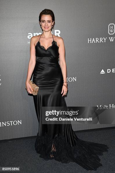 Nathalie Rapti Gomez walks the red carpet of amfAR Gala Milano on