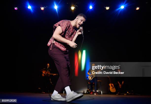 Guitarist Wayne Sermon, frontman Dan Reynolds, bassist Ben McKee and drummer Daniel Platzman of Imagine Dragons perform after the band, joined by VH1...