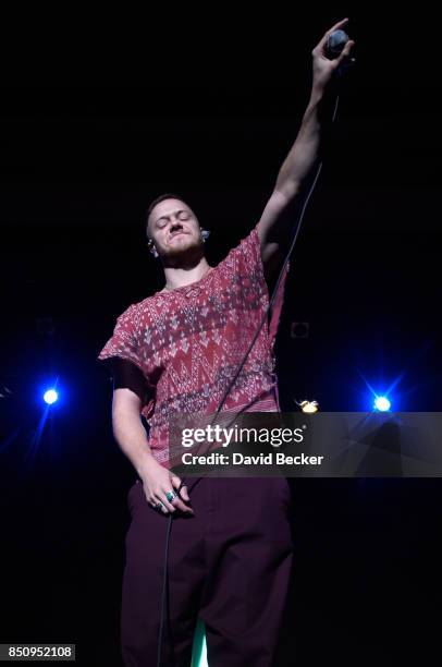 Frontman Dan Reynolds of Imagine Dragons performs after the band, joined by VH1 Save The Music Foundation, Life is Beautiful and Toyota, presented...