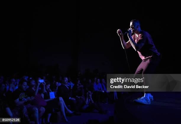 Frontman Dan Reynolds of Imagine Dragons performs after the band, joined by VH1 Save The Music Foundation, Life is Beautiful and Toyota, presented...