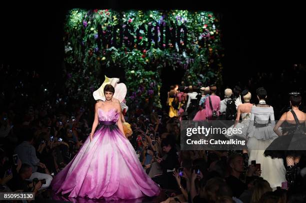 Models walk the runway at the Moschino Spring Summer 2018 fashion show during Milan Fashion Week on September 21, 2017 in Milan, Italy.