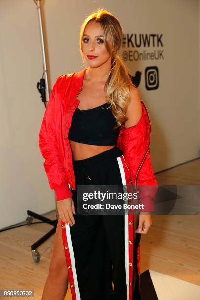 Amber Dowding poses during E! Entertainment Television celebrating 10 years of "Keeping Up With The Kardashians" giving fans an immersive experience...