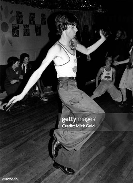 Dancers showing off the characteristic fashions and energetic dance moves of Northern Soul on the dance floor at an 'all-dayer', at The Palais,...