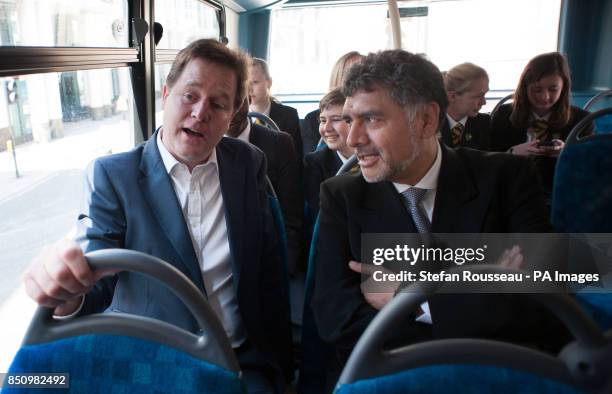 Deputy Prime Minister Nick Clegg and business entrepreneur James Caan meet teenagers aboard a bus travelling to several companies in London to...