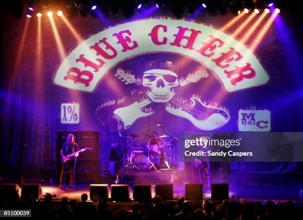 Photo of BLUE CHEER and Paul WHALEY and Duck MacDONALD and Dickie PETERSON, Group performing on stage L-R Duck MacDonald, drummer Paul Whaley and...