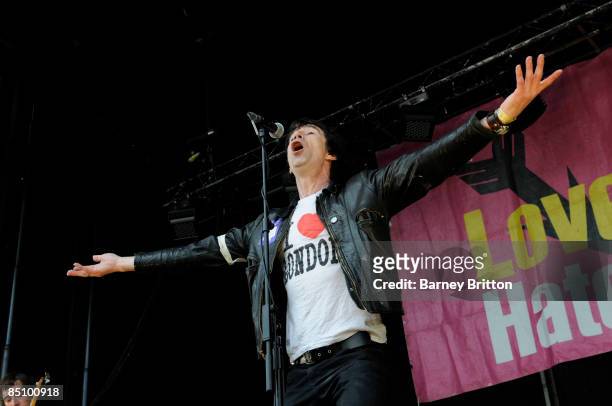 Photo of Jimmy PURSEY and SHAM 69, Jimmy Pursey performing on stage at the LMHR Carnival