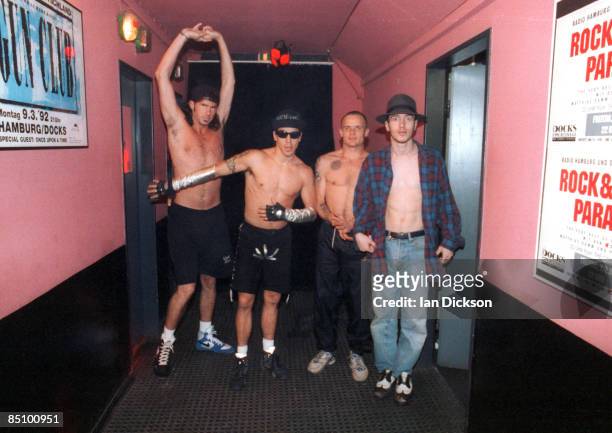 Photo of RED HOT CHILI PEPPERS and Anthony KIEDIS and FLEA and John FRUSCIANTE and Chad SMITH; Group portrait backstage L-R Chad Smith, Anthony...