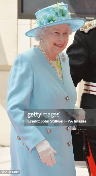 Queen Elizabeth II arrives to officially open the BBC's new 1 billion home in Portland Place central London.