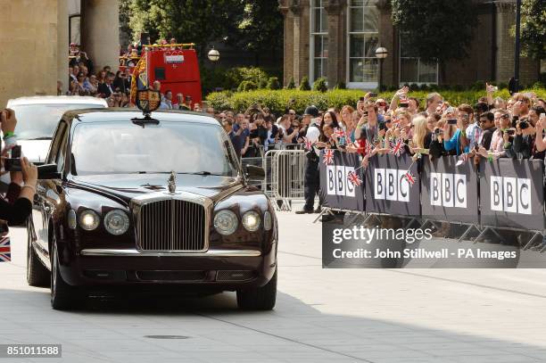 Crowds gather as Queen Elizabeth II, arrives to officially open the BBC's new &pound;1 billion home in Portland Place central London.