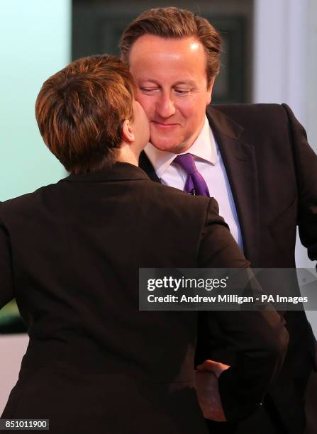 Prime Minister David Cameron kisses Scottish Conservative Leader Ruth Davidson before speaking at the Albert Halls in Stirling on the first day of...