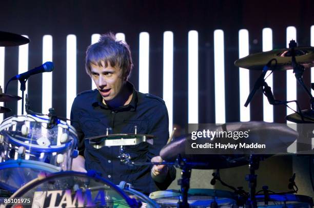 Photo of MUSE and Dominic HOWARD, Drummer Dominic Howard performing on stage at the Teenage Cancer Trust charity concert