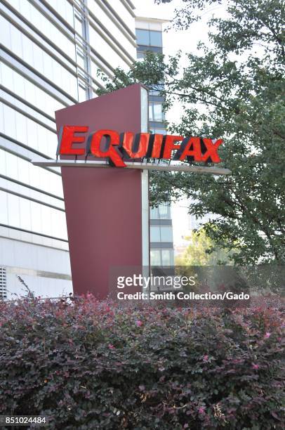 Sign with logo and a portion of the main building are visible at the headquarters of credit bureau Equifax in downtown Atlanta, Georgia, September...