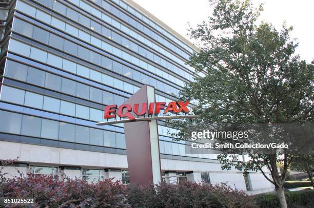 Sign with logo and a portion of the main building are visible at the headquarters of credit bureau Equifax in downtown Atlanta, Georgia, September...