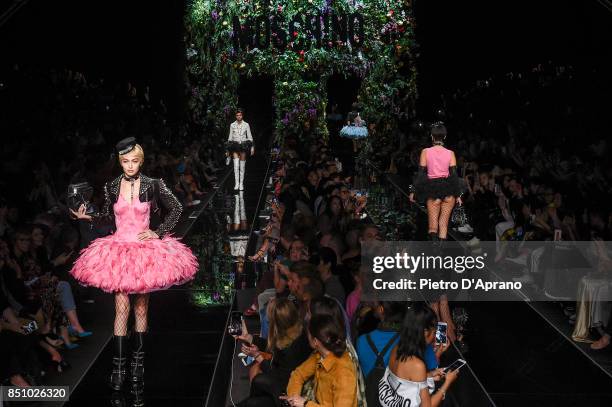 Model walks the runway at the Moschino show during Milan Fashion Week Spring/Summer 2018 on September 21, 2017 in Milan, Italy.