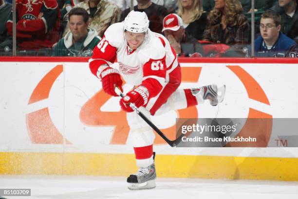 Marian Hossa of the Detroit Red Wings delivers a pass against the Minnesota Wild during the game at the Xcel Energy Center on February 21, 2009 in...