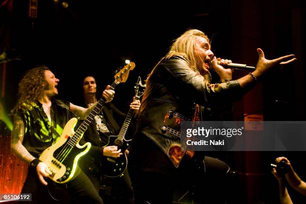 Photo of HELLOWEEN and Michael WEIKATH and Markus GROSSKOPF and Andi DERIS, L-R Markus Grosskopf, Michael Weikath and Andi Deris performing on stage