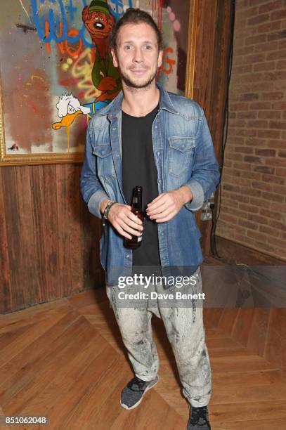 Robyn Ward attends a private view of his new exhibition "A Simpler Time " at the Old Chappell Piano Factory on September 21, 2017 in London, England.