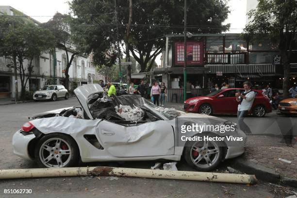 Destroyed Porsche car is seen two days after the magnitude 7.1 earthquake jolted central Mexico killing more than 250 hundred people, damaging...