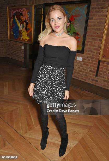Claudia Borg attends a private view of new exhibition "A Simpler Time " by artist Robyn Ward at the Old Chappell Piano Factory on September 21, 2017...