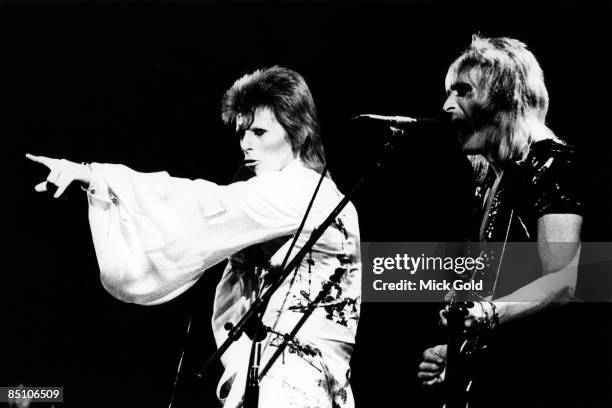 Photo of Mick RONSON and David BOWIE, David Bowie and Mick Ronson performing on stage - Ziggy Stardust retirement tour