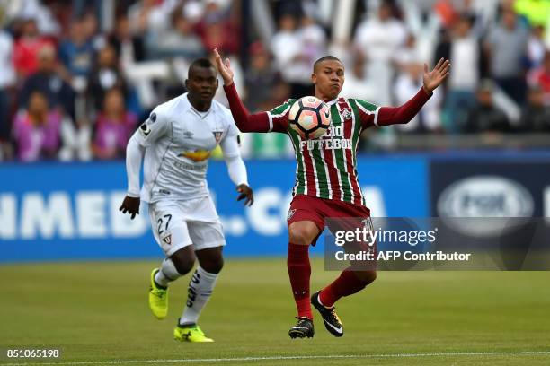 Brazil's Fluminense player Wellington Silva vies for the ball with Ecuador's Liga de Quito player Jonathan Betancourt during their 2017 Sudamericana...