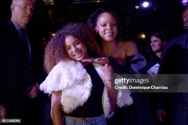 Rihanna poses with fans during the Fenty Beauty by Rihanna Paris launch party hosted by Sephora at Jardin des Tuileries on September 21, 2017 in...