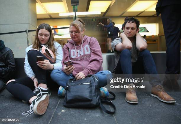 Crowds wait in anticipation for the release of the iPhone 8 and 8 Plus at Apple Store on September 22, 2017 in Sydney, Australia. Apple's latest...