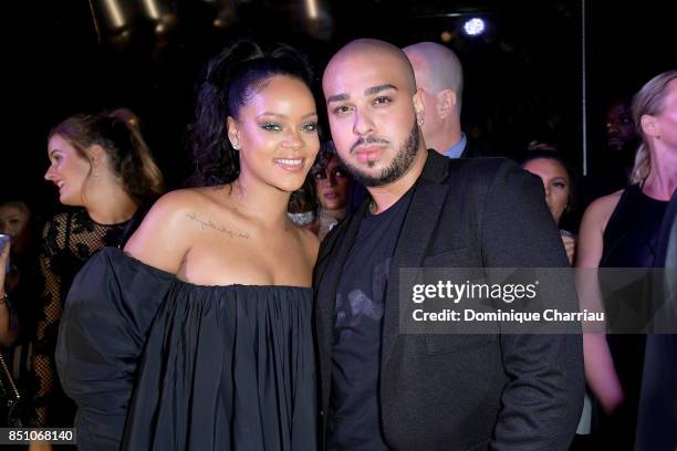 Rihanna poses with lead makeup artist Hector from the Sephora pro team during the Fenty Beauty by Rihanna Paris launch party hosted by Sephora at...