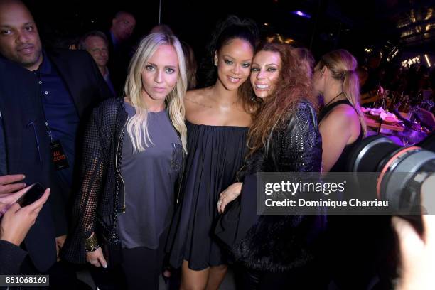 Rihanna poses with fans during the Fenty Beauty by Rihanna Paris launch party hosted by Sephora at Jardin des Tuileries on September 21, 2017 in...