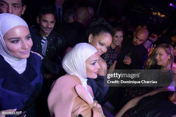 Rihanna poses with fans during the Fenty Beauty by Rihanna Paris launch party hosted by Sephora at Jardin des Tuileries on September 21, 2017 in...