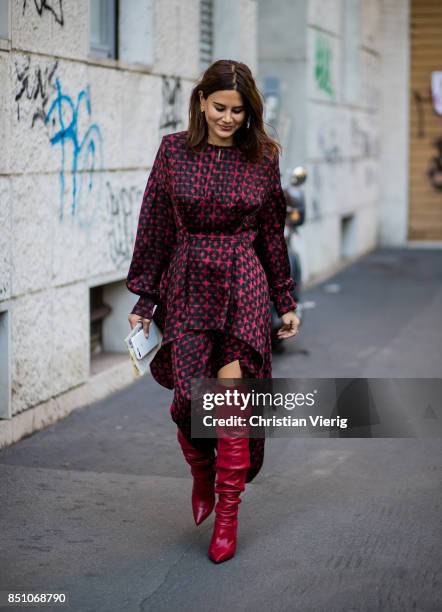 Christine Centenera is seen outside Prada during Milan Fashion Week Spring/Summer 2018 on September 21, 2017 in Milan, Italy.