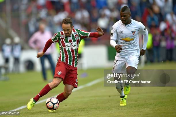 Brazil's Fluminense Lucas Marques vies for the ball with Ecuador's Liga de Quito Jonathan Betancourt during their 2017 Sudamericana Cup football...