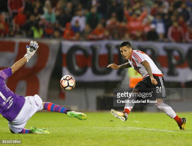 Enzo Perez of River Plate kicks the ball to score the fourth goal of his team during a second leg match between River Plate and Wilstermann as part...