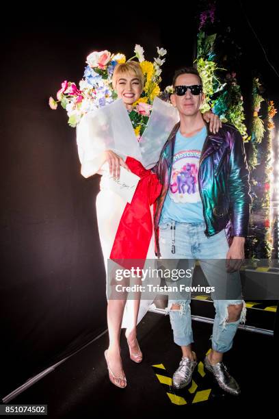 Gigi Hadid and Jeremy Scott are seen backstage ahead of the Moschino show during Milan Fashion Week Spring/Summer 2018 on September 21, 2017 in...