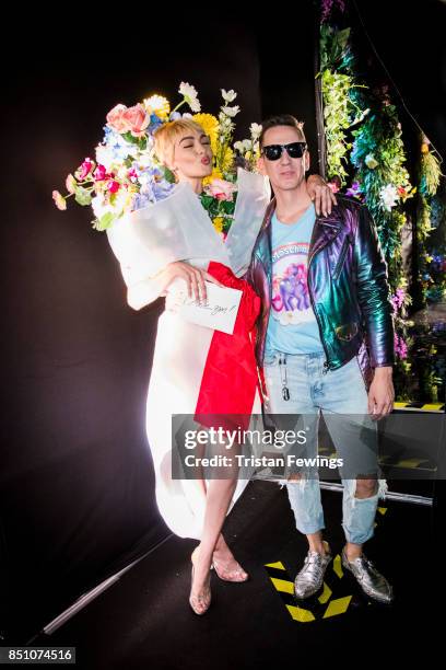 Gigi Hadid and Jeremy Scott are seen backstage ahead of the Moschino show during Milan Fashion Week Spring/Summer 2018 on September 21, 2017 in...