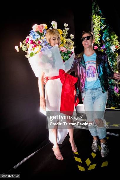 Gigi Hadid and Jeremy Scott are seen backstage ahead of the Moschino show during Milan Fashion Week Spring/Summer 2018 on September 21, 2017 in...