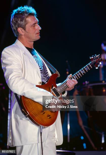 Photo of Mike OLDFIELD, Mike Oldfield performing on stage - Tubular Bells III