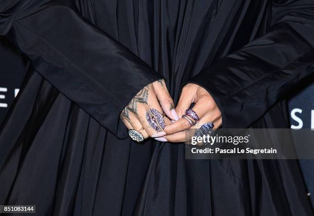 Rihanna, jewelry detail, attends the Fenty Beauty by Rihanna Paris launch party hosted by Sephora at Jardin des Tuileries on September 21, 2017 in...