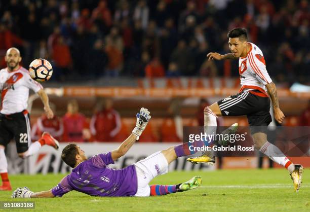 Enzo Perez of River Plate kicks the ball to scores the eighth goal of his team during a second leg match between River Plate and Wilstermann as part...