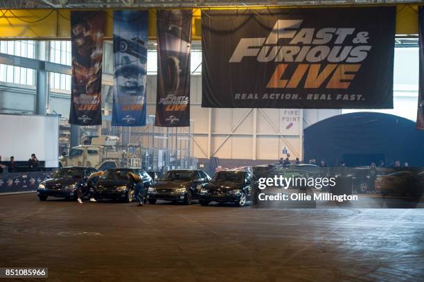 The shows stunt drivers giving a demonstration of driving from a scene in the peformance during the 'Fast & Furious Live' media launch day event on...